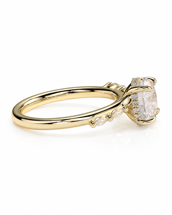color_10K_YG, color_14K_YG &&
A yellow gold ring featuring a large oval-cut clear center stone surrounded by small accent stones along the band, shown on a clean white background.
