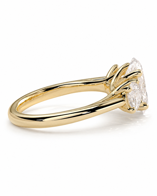 color_10K_YG, color_14K_YG &&A yellow gold solitaire engagement ring featuring a large, clear marquise-cut diamond in a prong setting, shown on a clean white background.