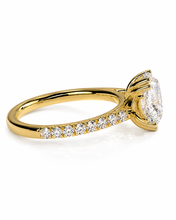 color_10K_YG, color_14K_YG &&A yellow gold engagement ring featuring a large oval-cut center stone and a pavé band with small round stones, shown on a clean white background.