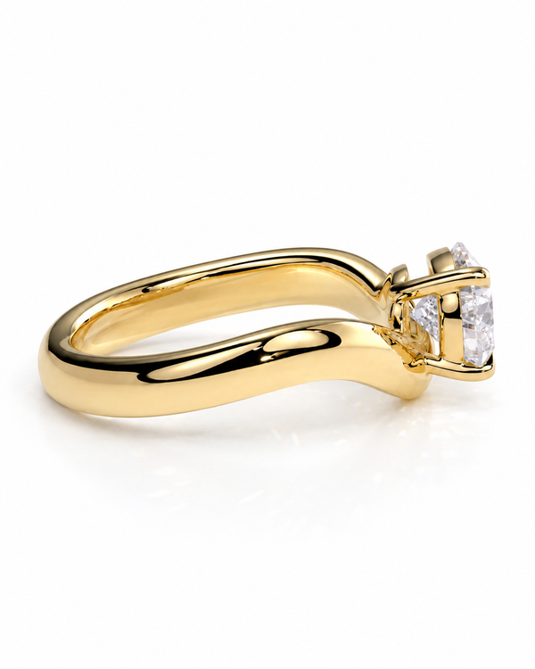 color_10K_YG, color_14K_YG &&A yellow gold ring with a curved band and a clear rectangular gemstone in a prong setting, shown on a white background.
