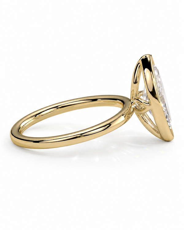 color_10K_YG, color_14K_YG &&A yellow gold ring with a single bezel-set clear gemstone, shown from a side profile view on a clean white background.