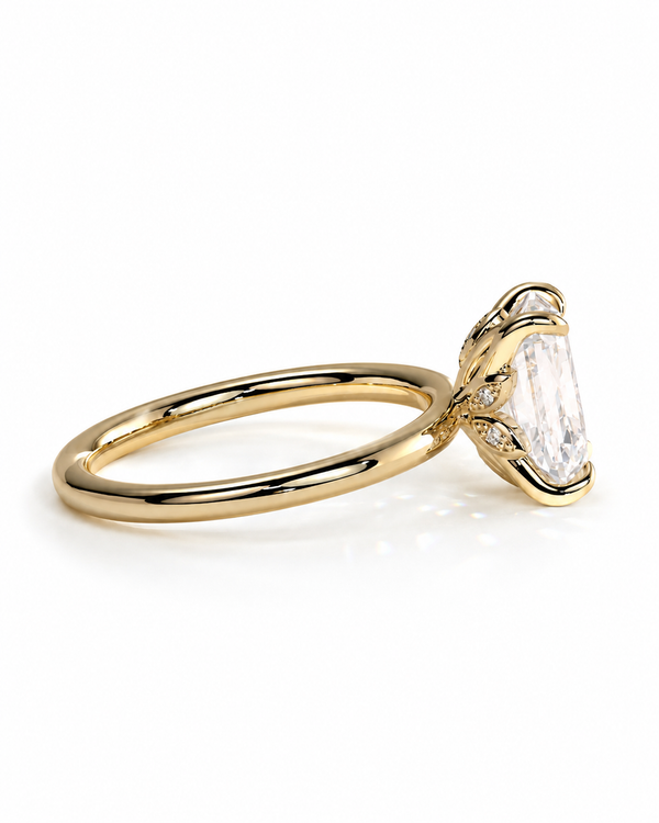 color_10K_YG, color_14K_YG &&A yellow gold ring featuring a large rectangular clear baguette-cut gemstone in a decorative setting with small accent stones, shown on a clean white background.