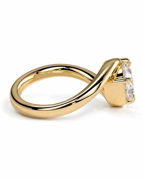 color_10K_YG, color_14K_YG &&A gold ring with a twisted band and a clear rectangular gemstone, shown on a plain white background.
