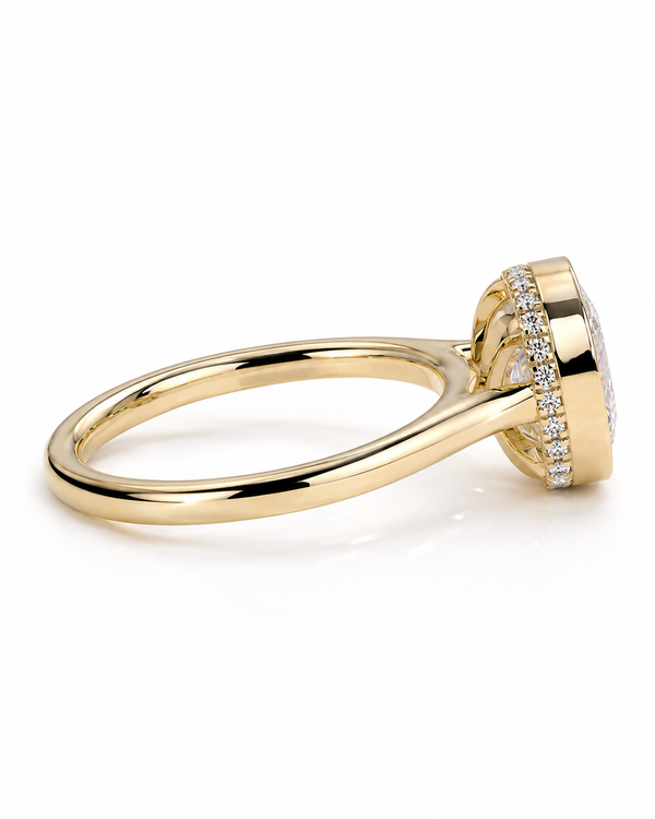 color_10K_YG, color_14K_YG &&A yellow gold ring with a halo setting featuring small clear stones, shown from a side angle on a clean white background.