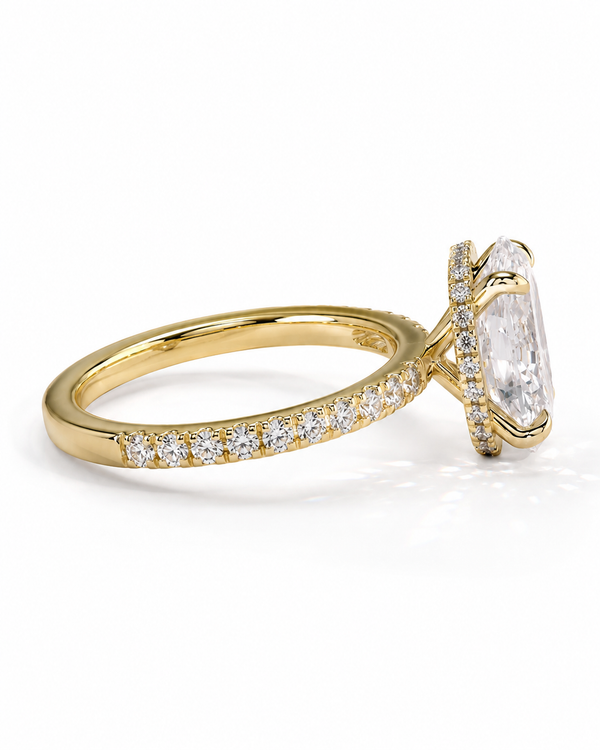 color_10K_YG, color_14K_YG &&A yellow gold engagement ring featuring a large oval-cut clear center stone and a pavé-set diamond band, shown on a clean white background.