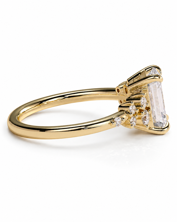 color_10K_YG, color_14K_YG &&A yellow gold ring featuring a large rectangular clear gemstone in a prong setting, accented by smaller round diamonds along the band, shown on a clean white background.