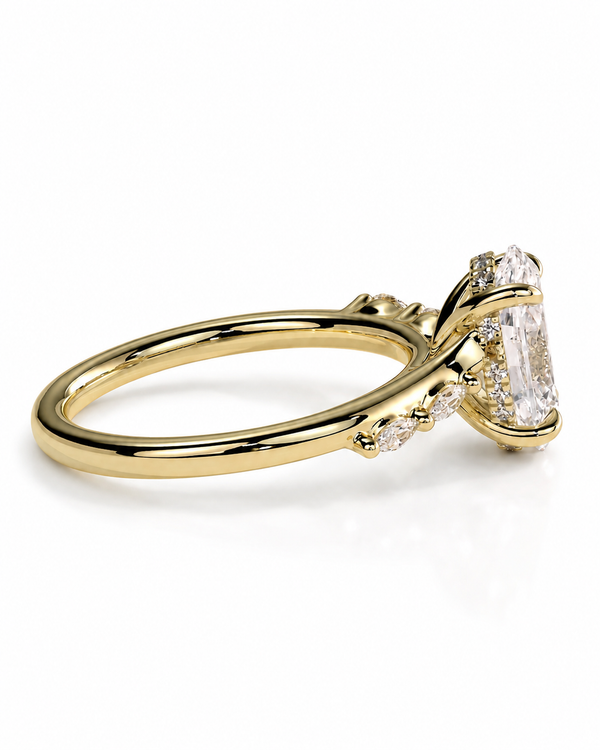 color_10K_YG, color_14K_YG &&A yellow gold ring featuring a large rectangular clear gemstone in a prong setting, with smaller accent stones along the band, shown on a clean white background.