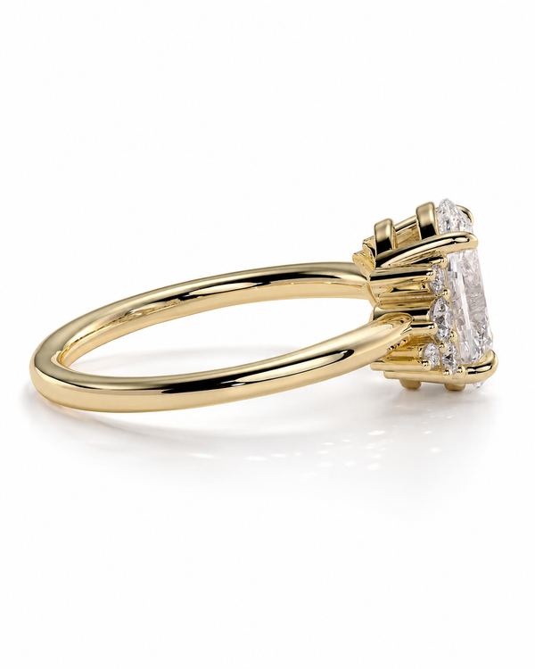 color_10K_YG, color_14K_YG &&A yellow gold ring featuring a large rectangular clear gemstone in a prong setting, with smaller side stones, shown on a clean white background.
