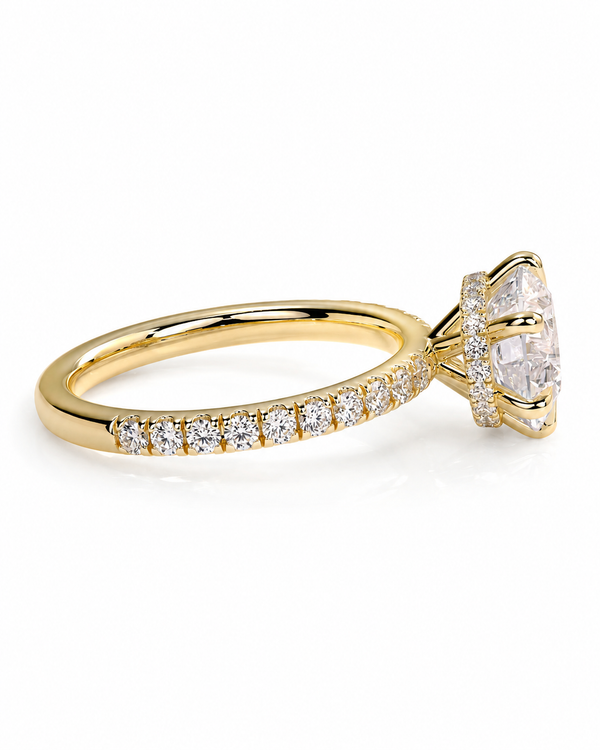 color_10K_YG, color_14K_YG &&
A yellow gold ring featuring a large oval-cut center stone and a pave-set band with smaller round stones, shown on a clean white background.