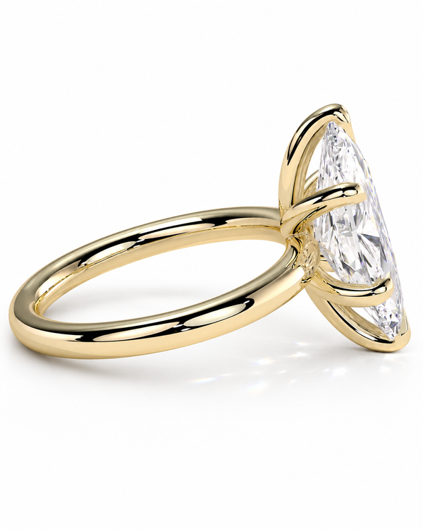 color_10K_YG, color_14K_YG &&A yellow gold solitaire ring featuring a large marquise-cut diamond, shown on a clean white background.