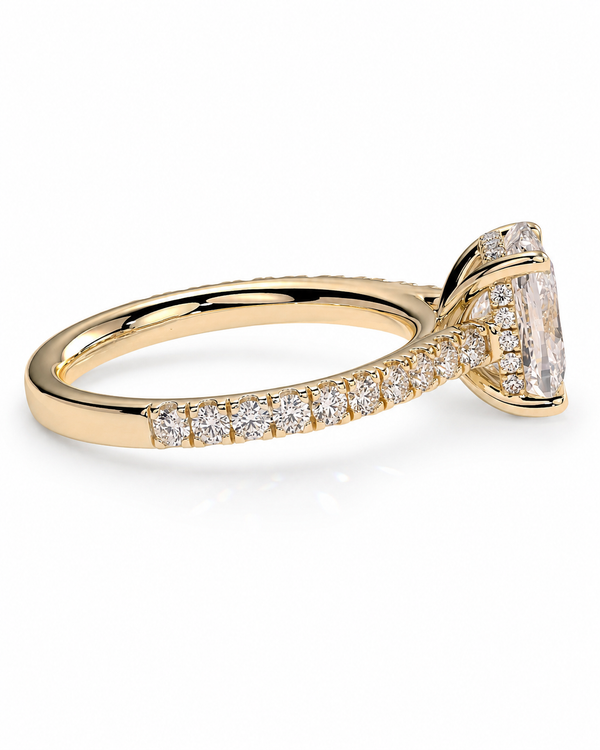 color_10K_YG, color_14K_YG &&A yellow gold engagement ring featuring a large rectangular emerald-cut center stone and a pave band set with small round stones, shown on a clean white background.