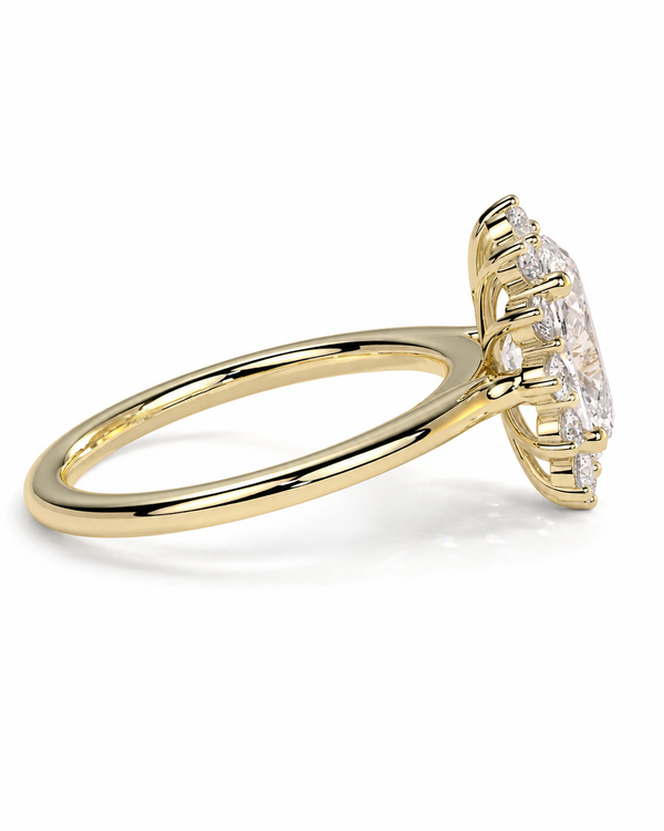 color_10K_YG, color_14K_YG &&A yellow gold ring with a large oval-cut clear gemstone in a prong setting, shown from a side angle on a clean white background.