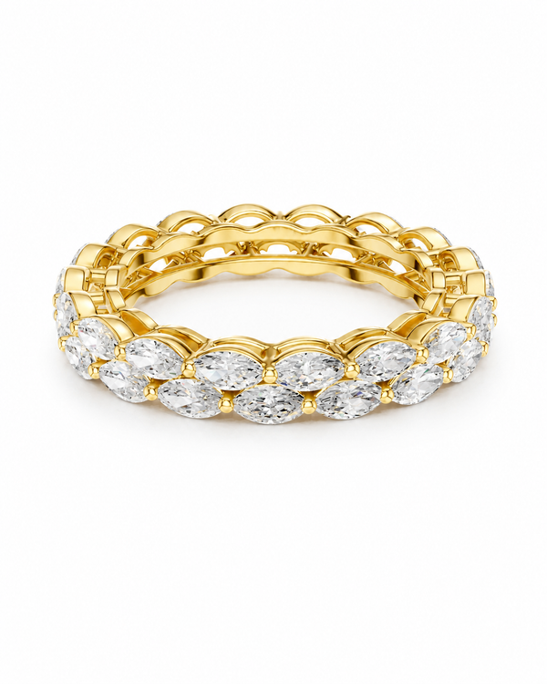color_10K_YG, color_14K_YG &&
A yellow gold eternity ring featuring a continuous row of round brilliant-cut diamonds, set against a clean white background.