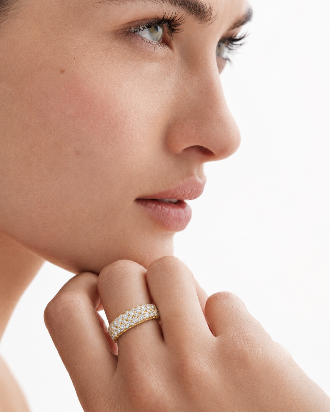color_10K_YG, color_14K_YG &&Premium wedding band for women displaying polished gold-tone finish and round moissanite accents.