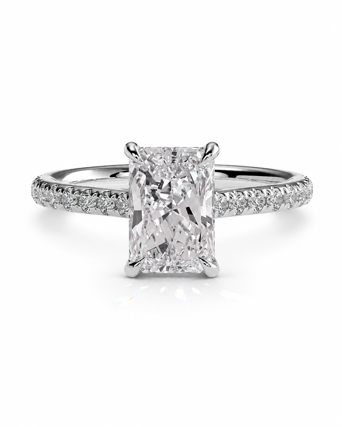 color_925_SIL,color_935_ARG,color_10K_WG, color_14K_WG &&
An engagement ring featuring a large rectangular radiant-cut diamond center stone in a four-prong setting, with a pavé-set diamond band in a silver-colored metal, shown on a clean white background.
