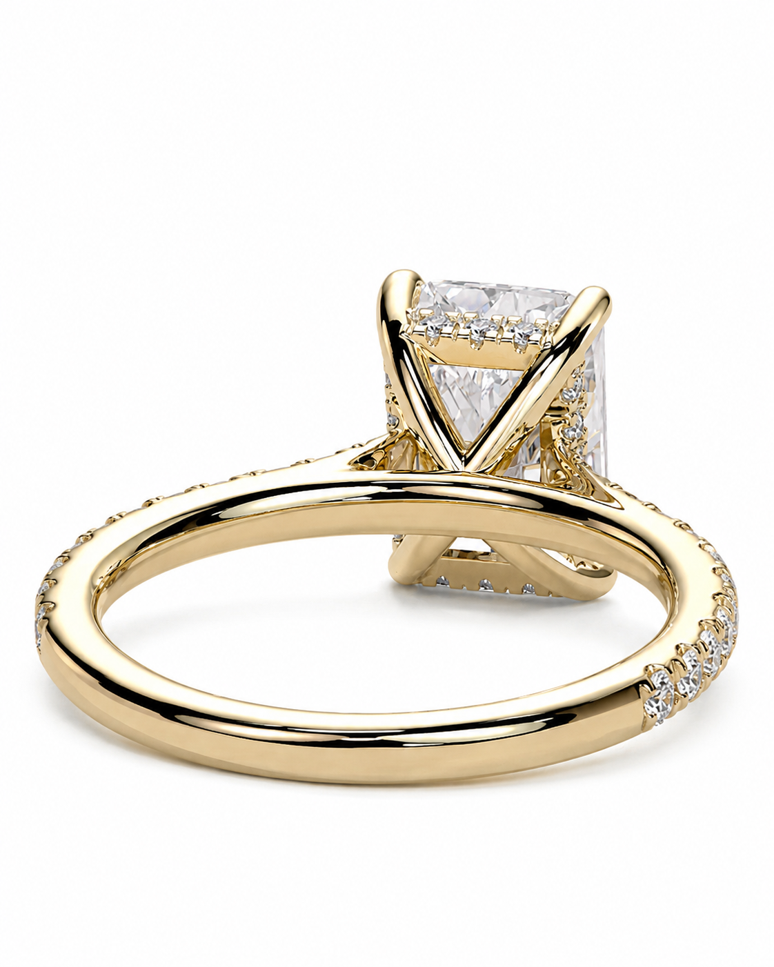 color_10K_YG, color_14K_YG &&
A yellow gold engagement ring featuring a rectangular clear gemstone in a V-prong setting, with a split shank adorned with small pave diamonds, shown on a white background.