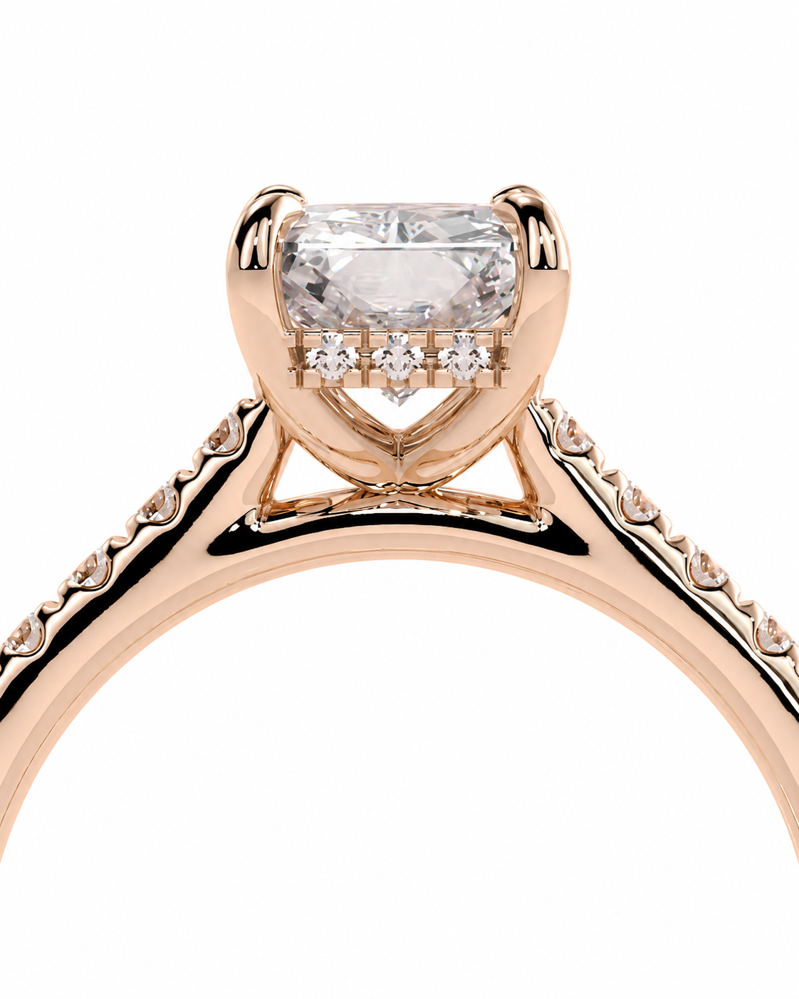 color_10K_RG, color_14K_RG &&
Rose gold solitaire engagement ring with a cushion-cut diamond center stone and three small accent diamonds, shown on a white background.
