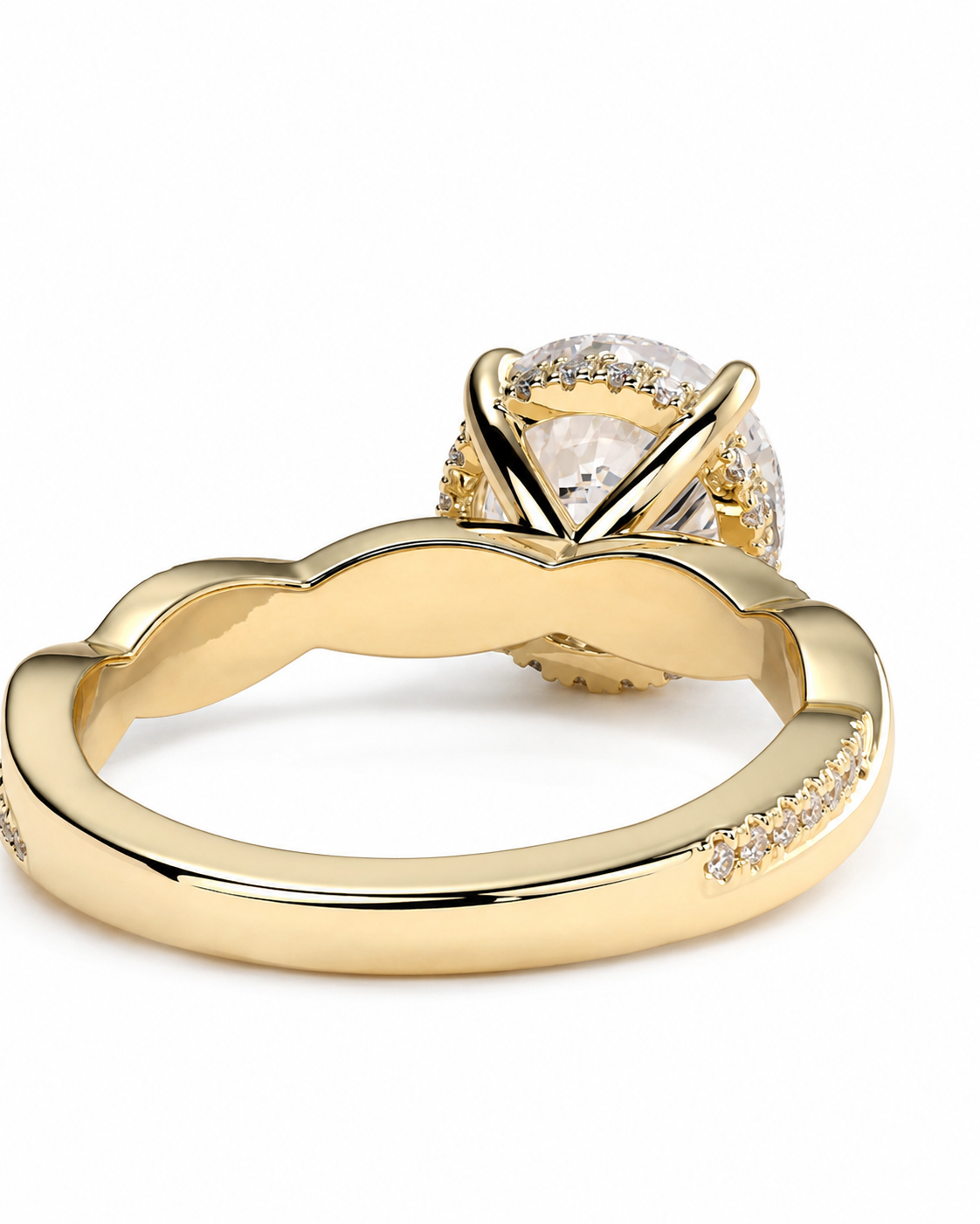 color_10K_YG, color_14K_YG &&
A yellow gold ring with a scalloped band, pave-set accent stones, and a large round-cut center stone in a prong setting, shown on a white background.