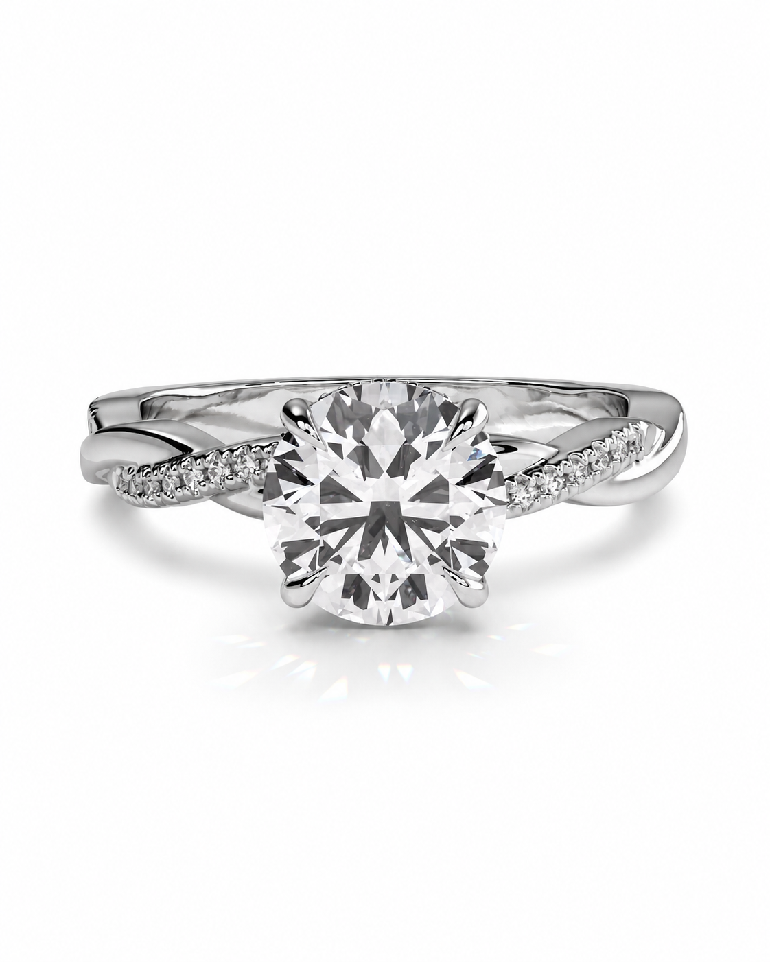 color_925_SIL,color_935_ARG,color_10K_WG, color_14K_WG &&
A silver-toned solitaire engagement ring featuring a round brilliant-cut center stone with a twisted pave band, set against a clean white background.