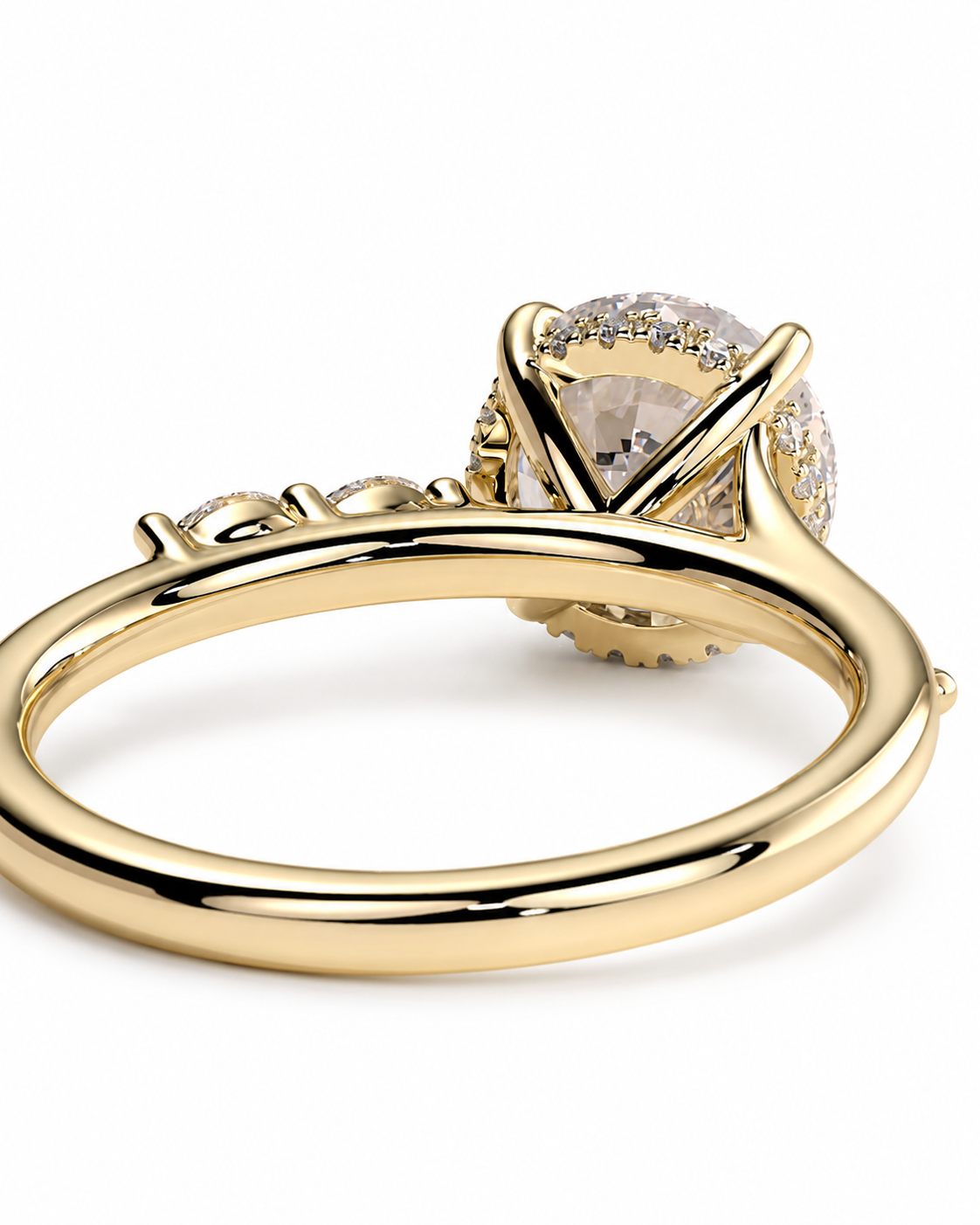 color_10K_YG, color_14K_YG &&
A yellow gold ring with a large round clear center stone and a halo of small clear stones, shown on a clean white background.