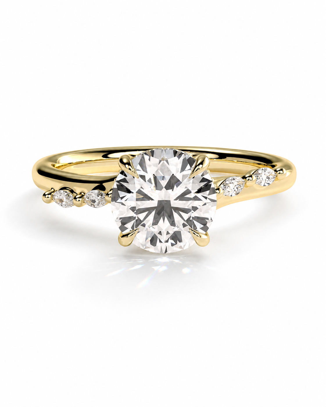 color_10K_YG, color_14K_YG &&
A yellow gold solitaire engagement ring with a round brilliant-cut center stone and small accent diamonds on the band, set against a clean white background.