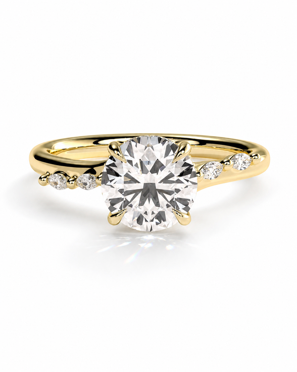 color_10K_YG, color_14K_YG &&
A yellow gold solitaire engagement ring with a round brilliant-cut center stone and small accent diamonds on the band, set against a clean white background.