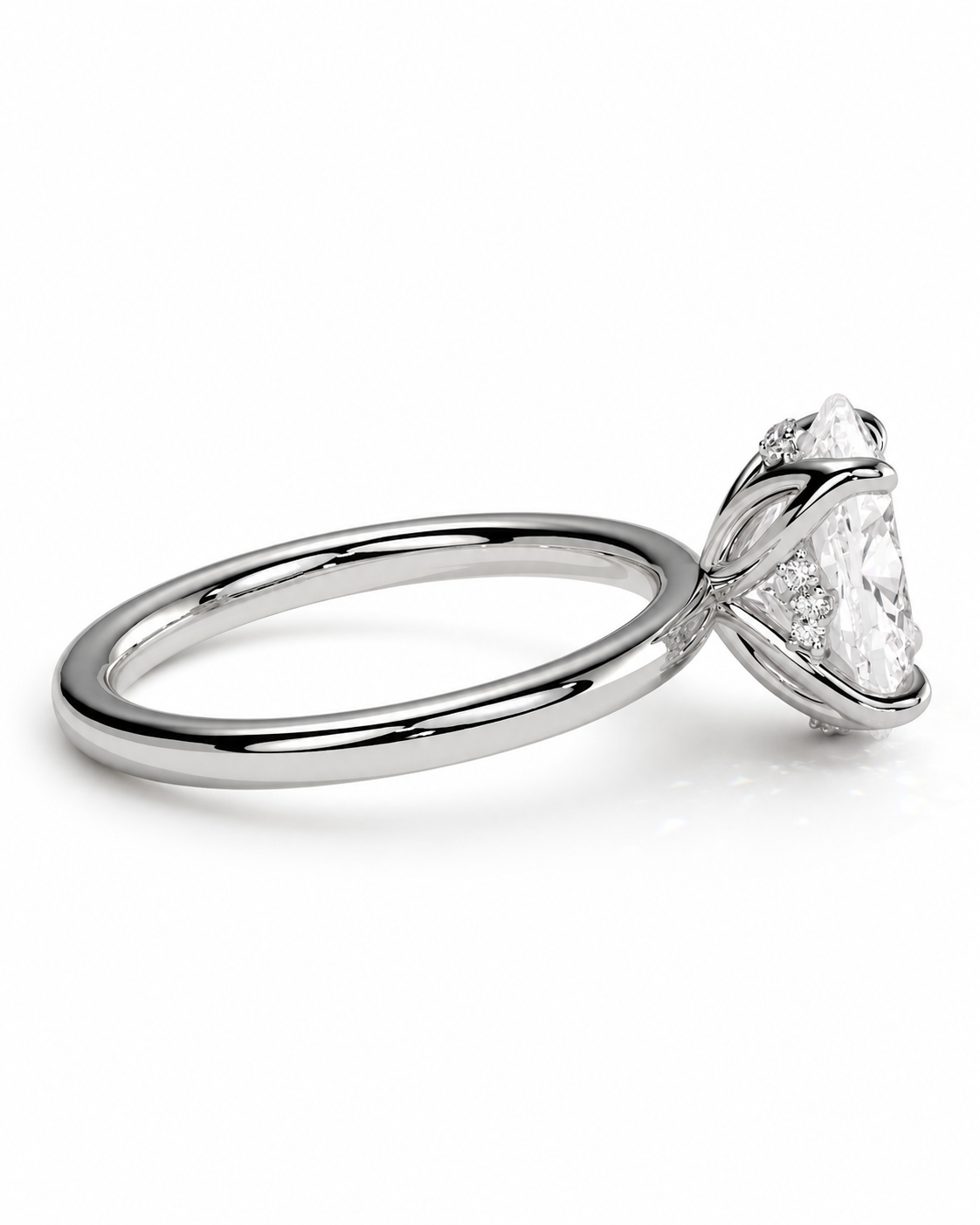 color_925_SIL,color_935_ARG,color_10K_WG, color_14K_WG &&
A silver-toned diamond ring with a large clear round-cut center stone and smaller accent stones in a prong setting, shown on a clean white background.