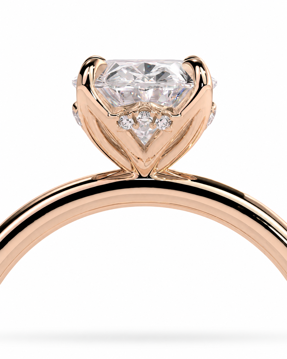 color_10K_RG, color_14K_RG &&
A close-up of a rose gold ring with a heart-shaped diamond solitaire and small accent diamonds, set against a clean white background.