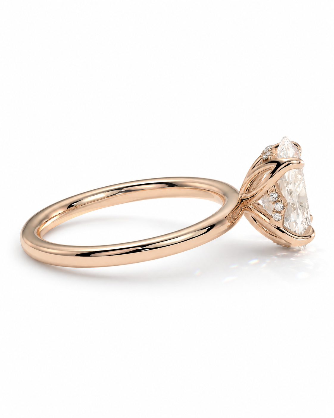 color_10K_RG, color_14K_RG &&
A rose gold engagement ring featuring a large pear-cut clear center stone in a twisted basket setting, with small accent diamonds along the band, shown on a clean white background.