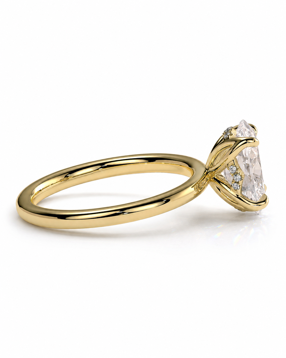 color_10K_YG, color_14K_YG &&
A yellow gold solitaire engagement ring with a clear marquise-cut center stone and small accent stones on the band, shown on a clean white background.