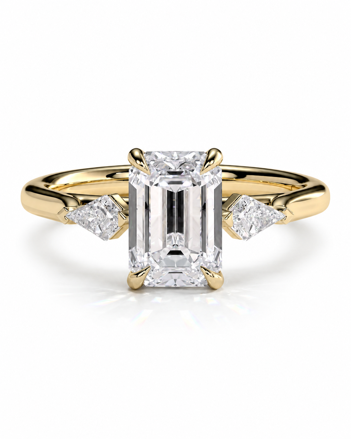 color_10K_YG, color_14K_YG &&
A yellow gold engagement ring featuring a large emerald-cut diamond center stone and two smaller round-cut diamonds on the shoulders, set against a clean white background.