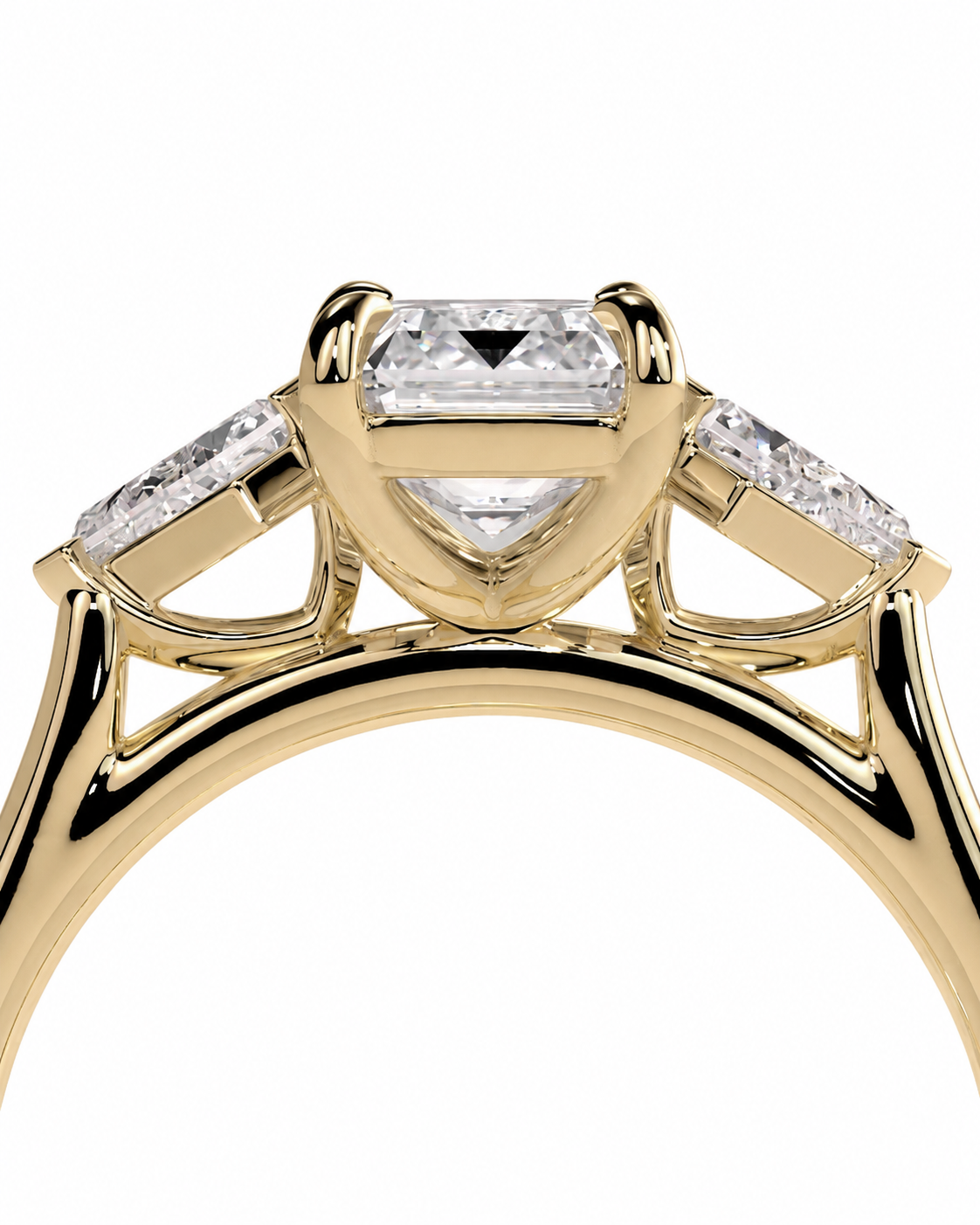 color_10K_YG, color_14K_YG &&
A close-up of a yellow gold ring featuring a central princess-cut diamond and smaller diamonds on the shoulders, set against a plain white background.
