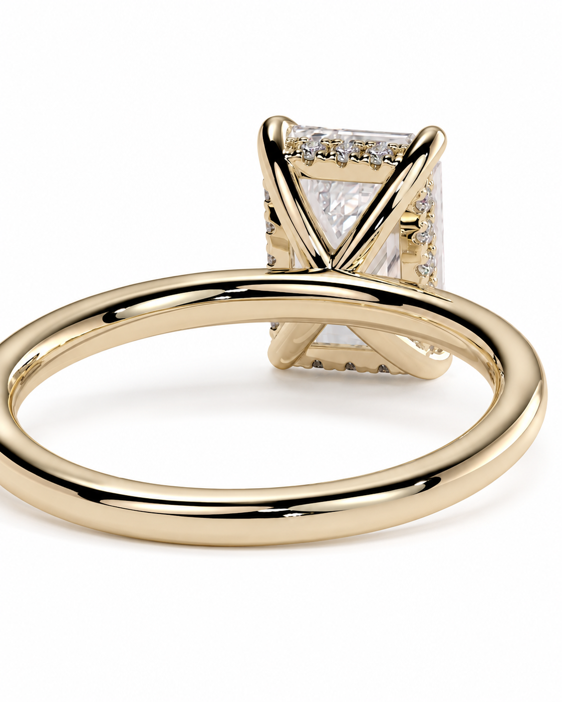 color_10K_YG, color_14K_YG &&
A yellow gold ring featuring a rectangular clear gemstone in a prong setting with an X-shaped gold band and small accent diamonds, shown on a clean white background.