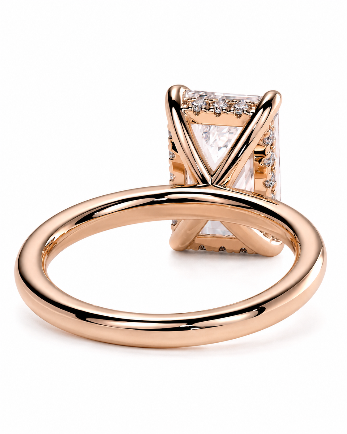 color_10K_RG, color_14K_RG &&
A rose gold ring with a square-cut clear gemstone in a prong setting, accented with small pave diamonds along the sides, shown on a clean white background.