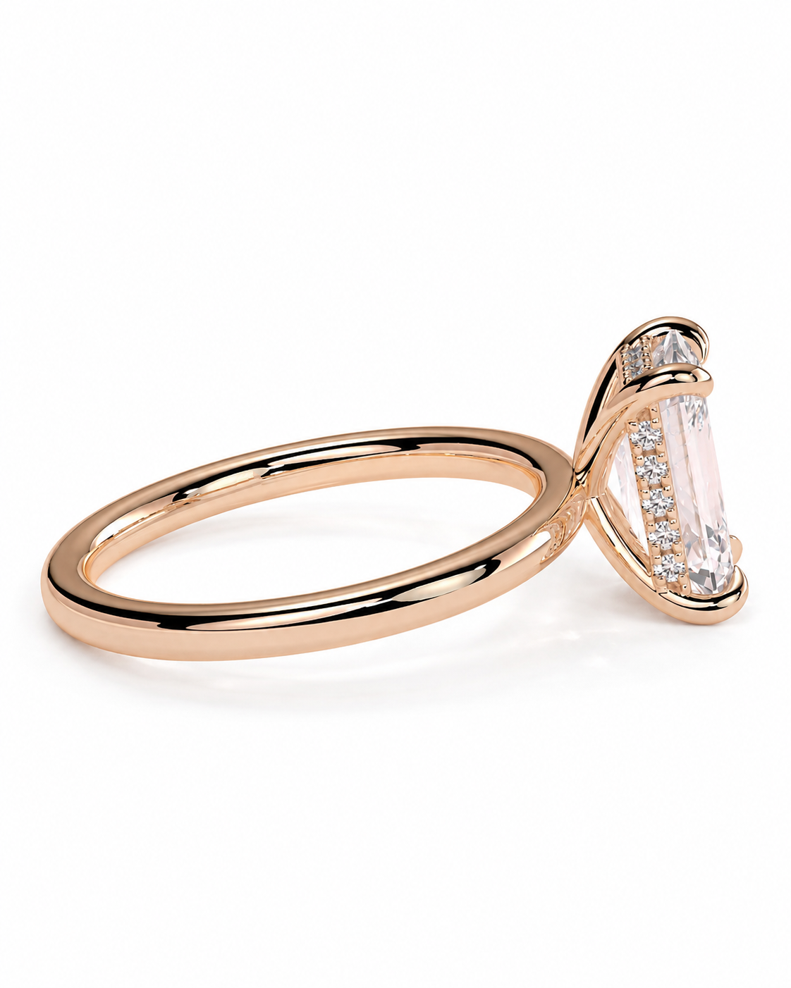 color_10K_RG, color_14K_RG &&
A rose gold ring featuring a large rectangular clear baguette center stone accented by small pavé diamonds on the setting, shown on a clean white background.