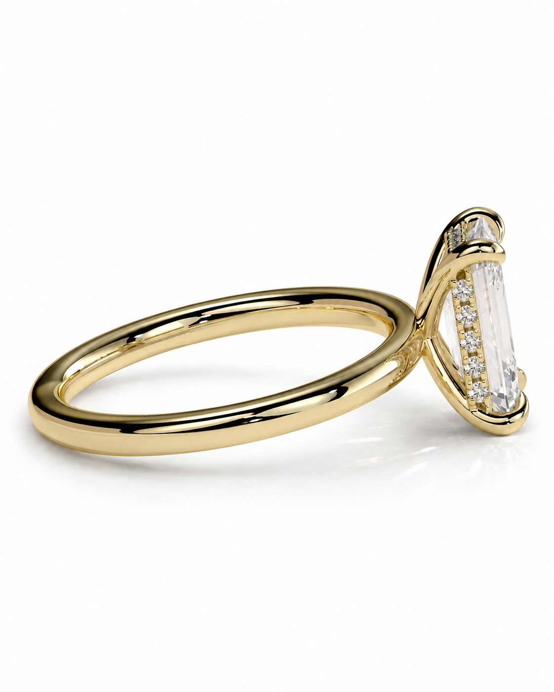 color_10K_YG, color_14K_YG &&
A yellow gold ring featuring a large baguette-cut clear center stone accented by smaller round stones on the setting, shown on a clean white background.