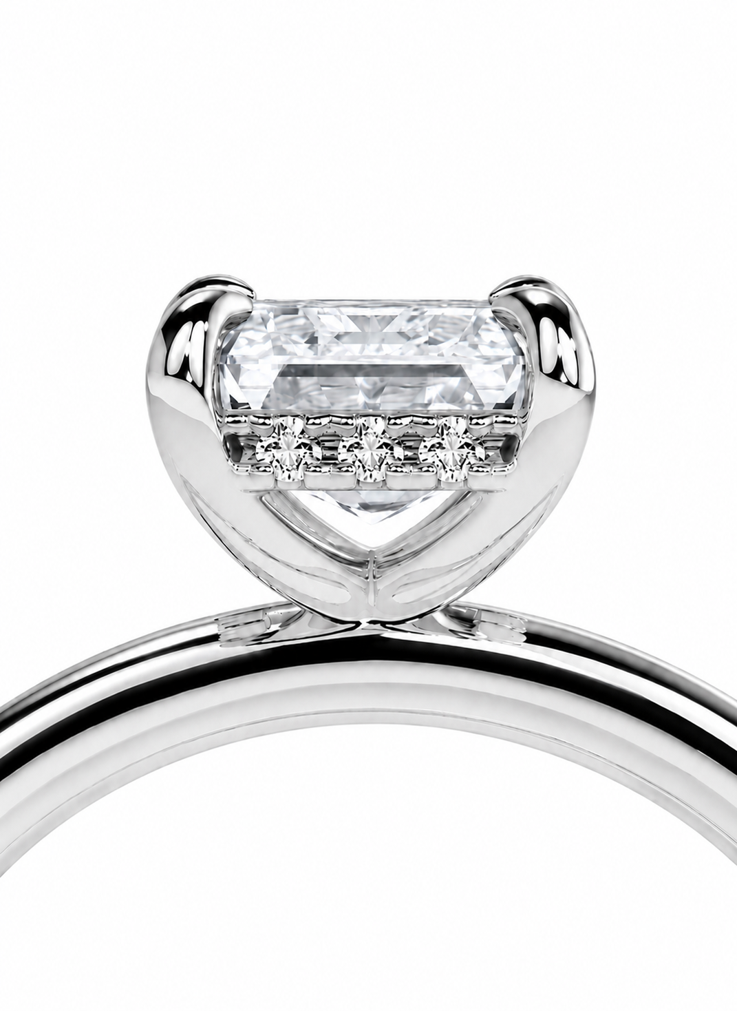 color_925_SIL,color_935_ARG,color_10K_WG, color_14K_WG &&
A close-up studio shot of a silver-toned ring featuring a large rectangular clear gemstone in a prong setting with smaller accent stones along the band, shown against a plain white background.