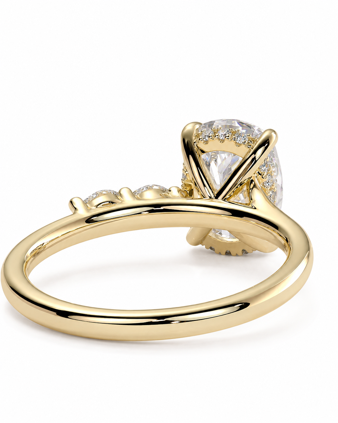 color_10K_YG, color_14K_YG &&
A yellow gold solitaire engagement ring featuring a round brilliant-cut clear center stone in a prong setting, with a pave band accented by small round stones, shown on a white background.