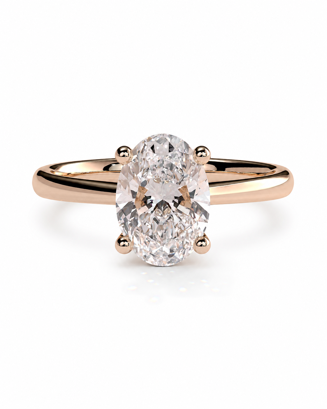 color_10K_RG, color_14K_RG &&An oval-cut diamond engagement ring in a rose gold band with a four-prong setting, shown on a clean white background.