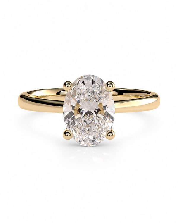 color_10K_YG, color_14K_YG &&An oval-cut diamond engagement ring in a yellow gold band with a four-prong setting, shown on a clean white background.