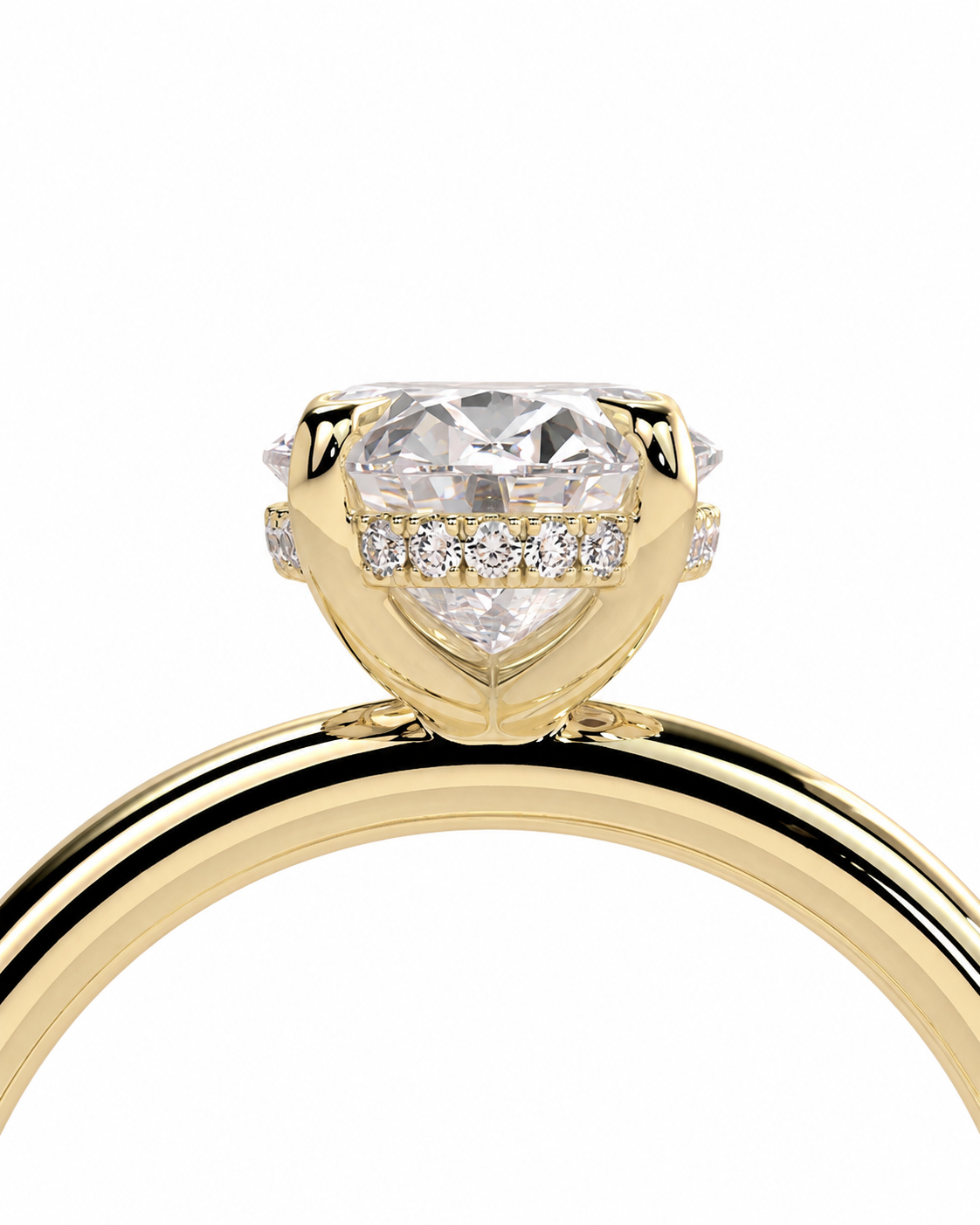 color_10K_YG, color_14K_YG &&A close-up of a yellow gold ring featuring a large heart-shaped clear gemstone in a prong setting, with a row of smaller round diamonds along the band, shown against a plain white background.