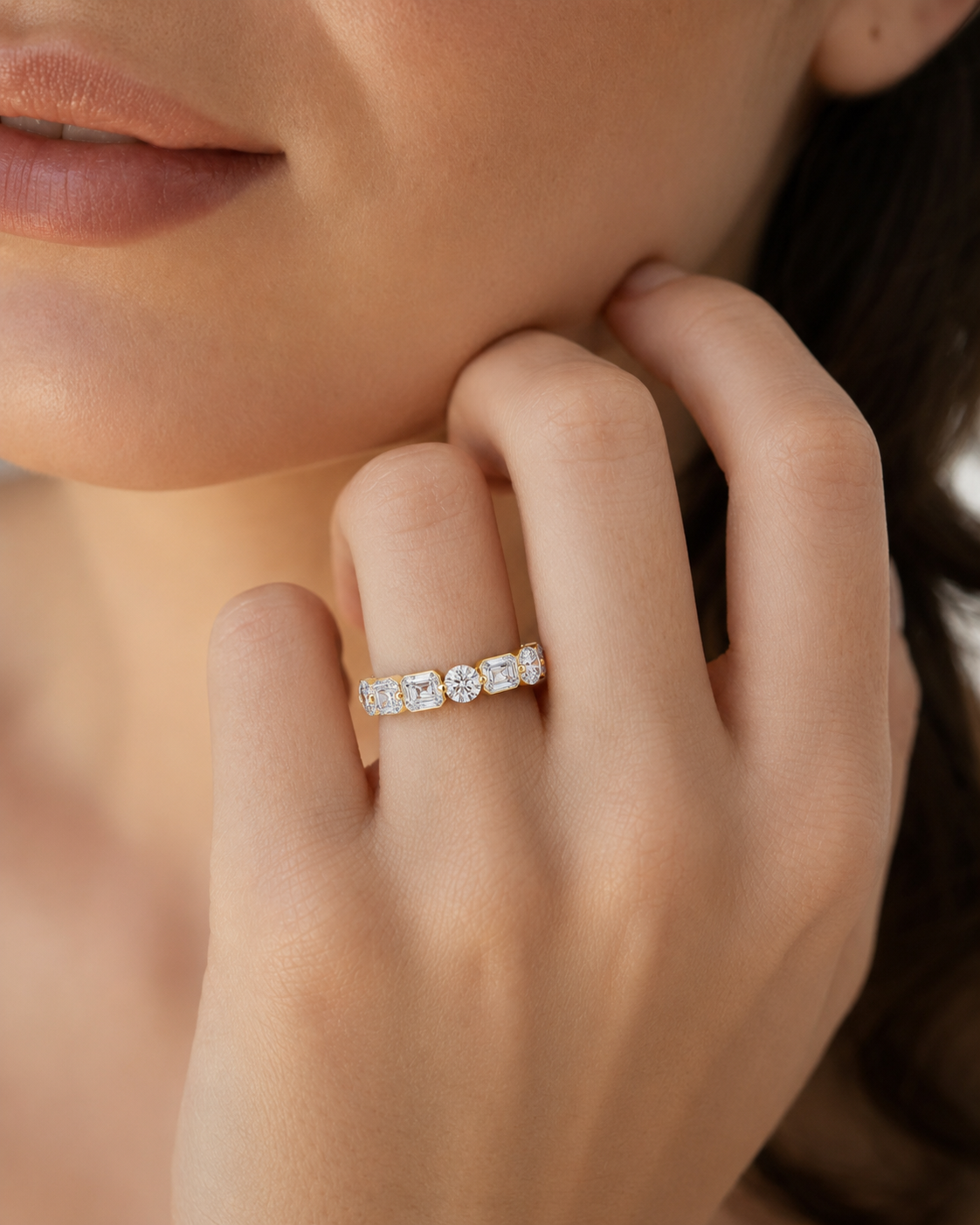 color_10K_YG, color_14K_YG &&	
Close-up of a handcrafted moissanite wedding band with mixed-cut full eternity design.