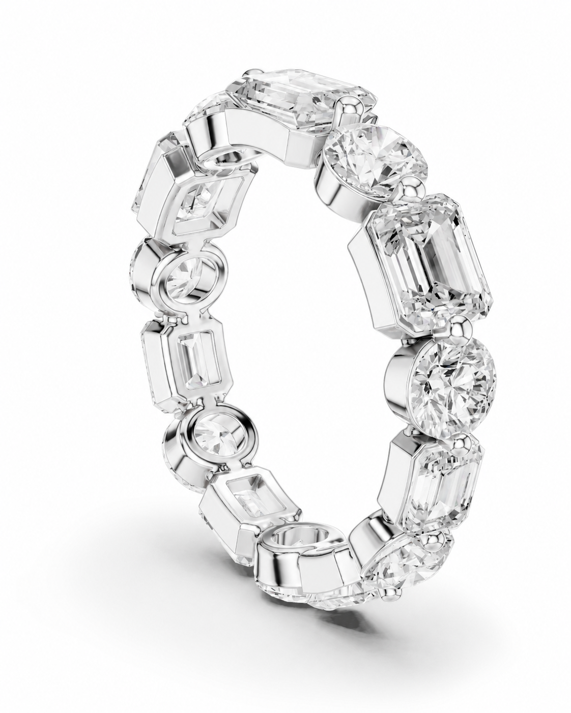 color_925_SIL,color_935_ARG,color_10K_WG, color_14K_WG &&	
A silver-toned diamond eternity ring featuring a continuous line of round and emerald-cut diamonds on a clean white background.