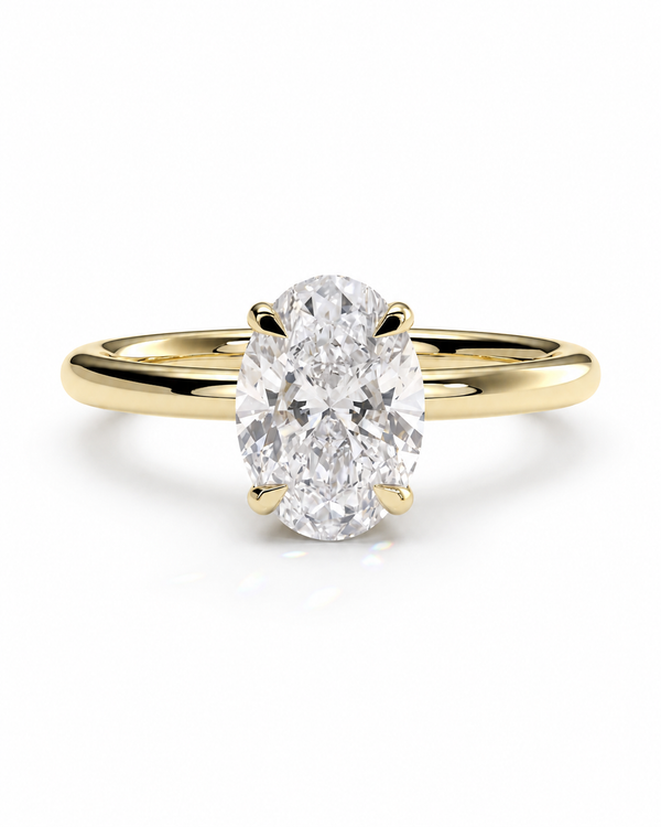 color_10K_YG, color_14K_YG &&An oval diamond engagement ring with a yellow gold band, shown on a clean white background.