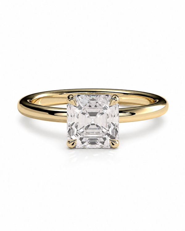 color_10K_YG, color_14K_YG &&A yellow gold engagement ring featuring a large, square-cut clear gemstone in a four-prong setting, shown on a clean white background.
