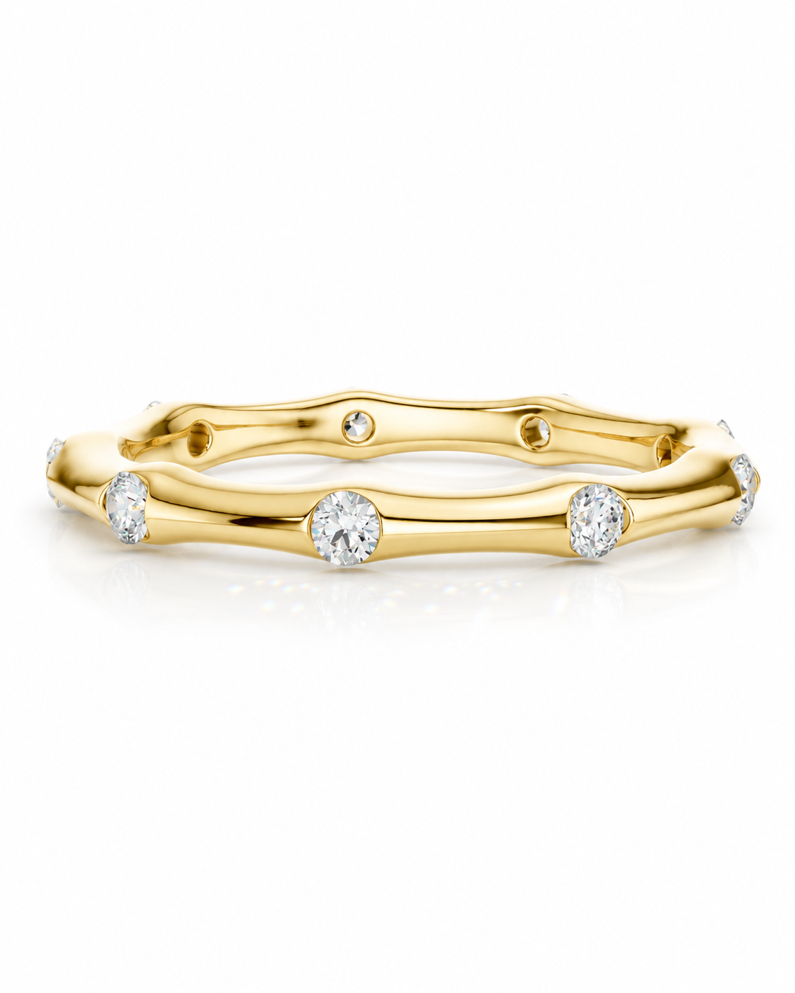 color_10K_YG, color_14K_YG &&	
Front angle of a full eternity moissanite wedding band with bezel-set round stones.