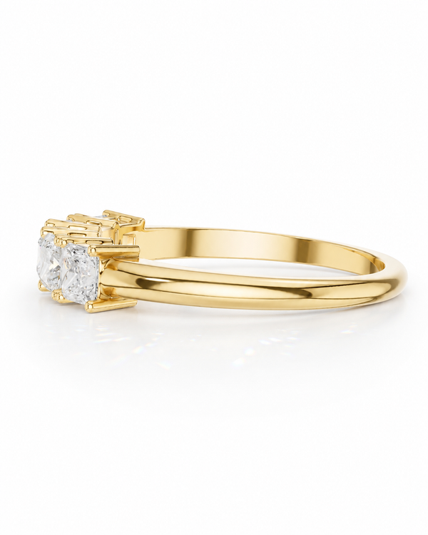 color_10K_YG, color_14K_YG &&	
Shared-prong moissanite anniversary band with near colorless princess-cut stones.