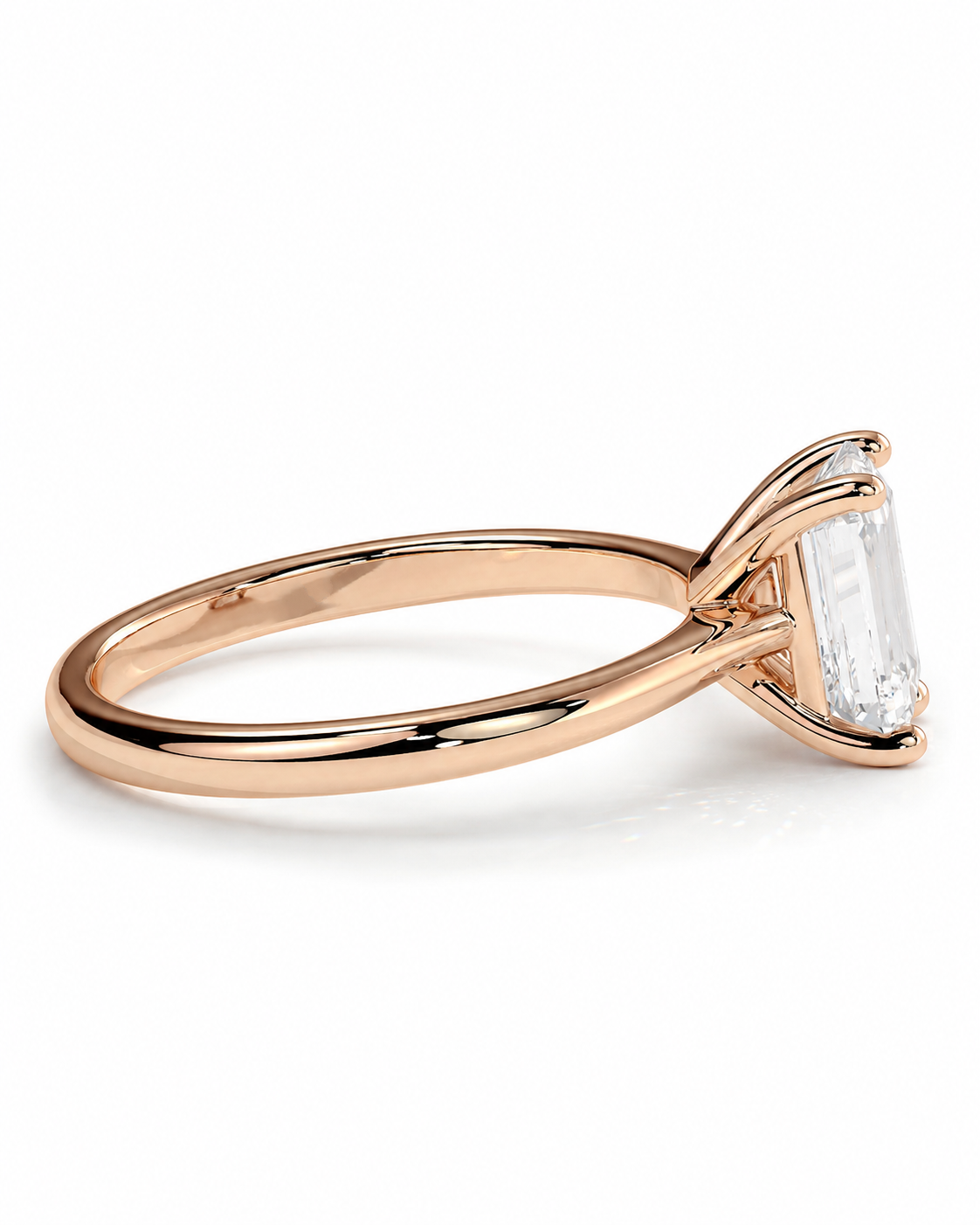 color_10K_RG, color_14K_RG &&A rose gold engagement ring featuring a large rectangular clear baguette gemstone in a prong setting, shown on a clean white background.