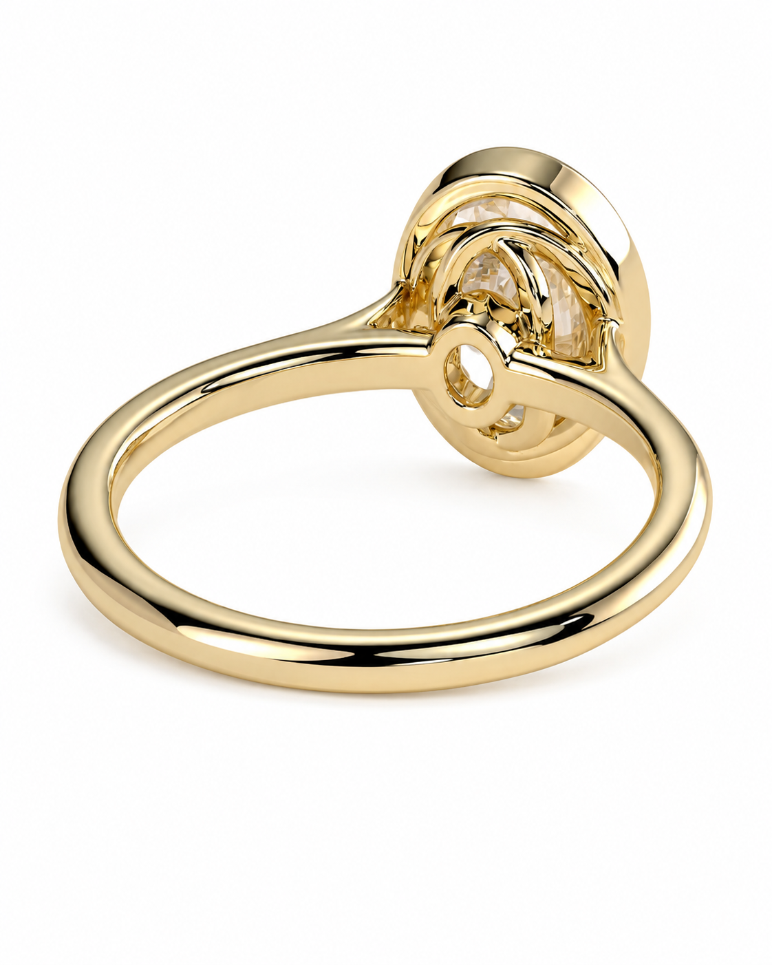 color_10K_YG, color_14K_YG &&A polished yellow gold ring with a unique knotted band design and a bezel-set clear gemstone, shown on a clean white background.