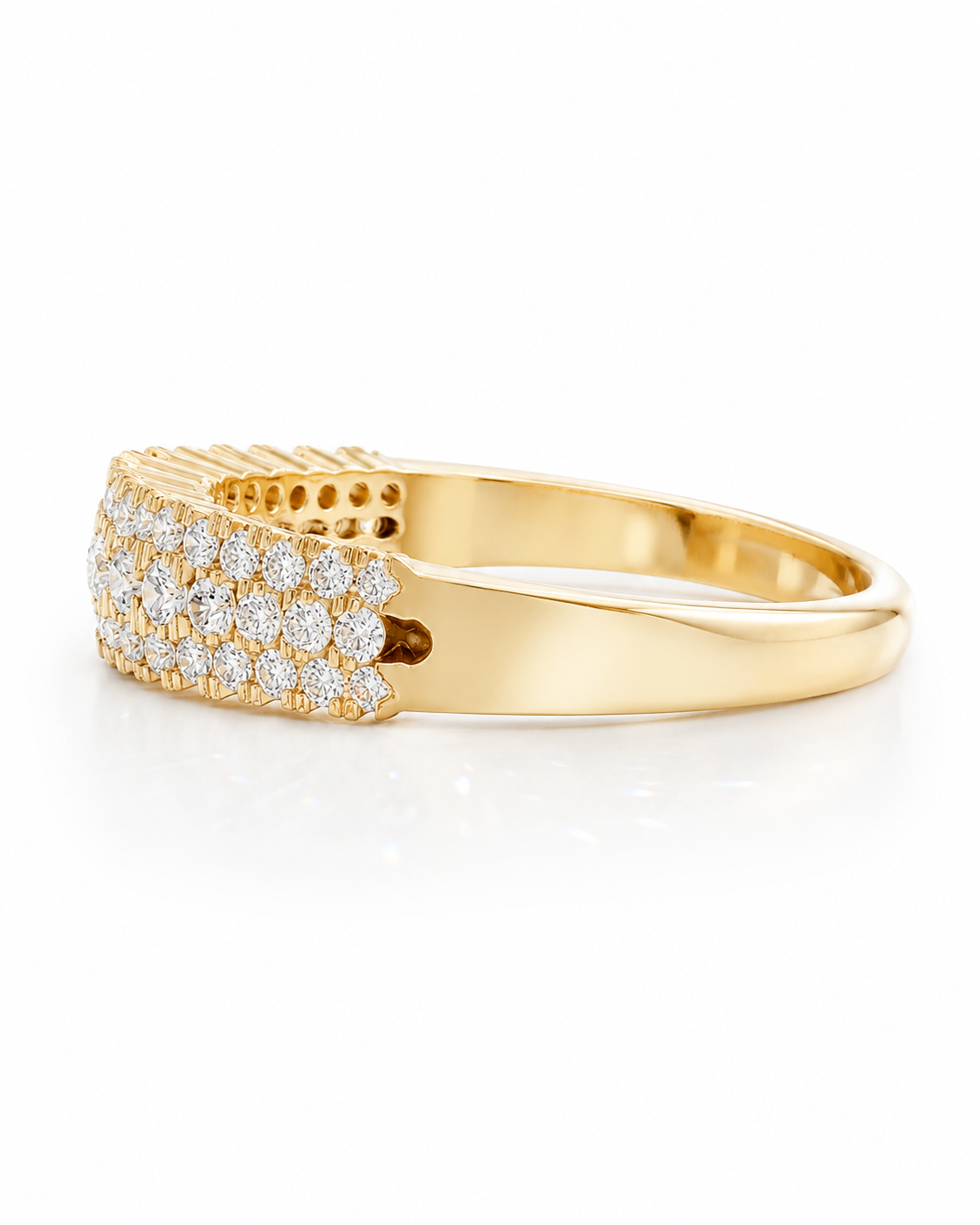 color_10K_YG, color_14K_YG &&	
Women's moissanite wedding band featuring a tapered pave stone arrangement.